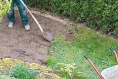 What is the easiest way to dig up grass?