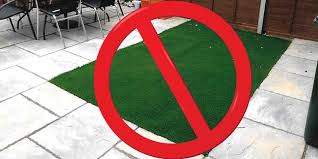How can I hide the edges of my artificial grass?