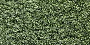How can I make my artificial grass fluffy again?